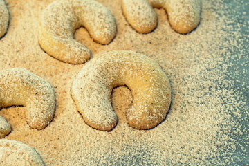 Fototapeta na wymiar close up of a vanilla crescent with powdered sugar
