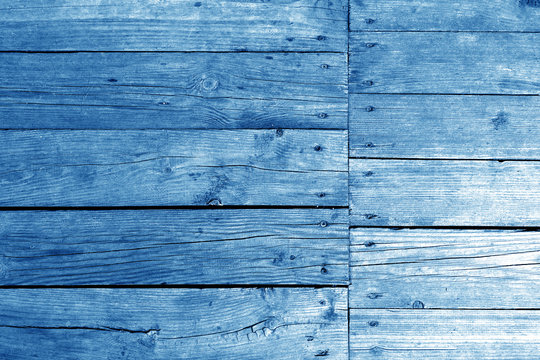 Old wooden wall in navy blue tone.