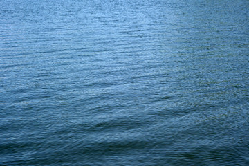 Lake water with tiny waves