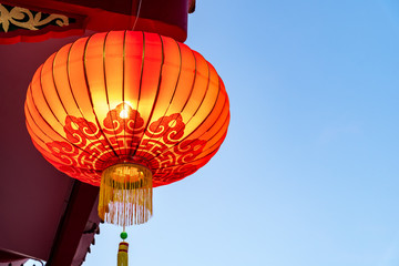 Red lantern against blue sky with copy space - Chinese new Year Concept