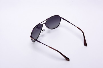 Fashionable sunglasses on a white background