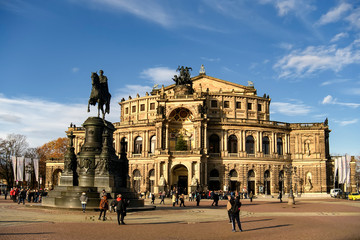 Fototapeta premium Saxon State Opera Semperoper and Statue of King Johann Konig Johann on Theaterplatz in Dresden, Germany. November 2019