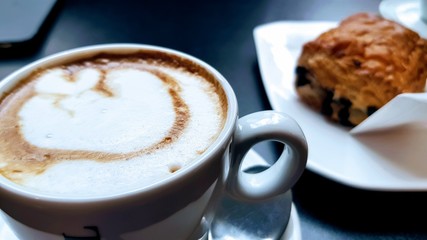 milk coffee with chcolate pastry