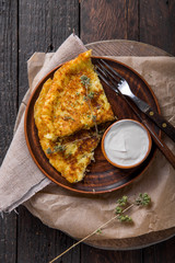 Irish Potato pancakes, latkes or boxty and sauces on wooden background