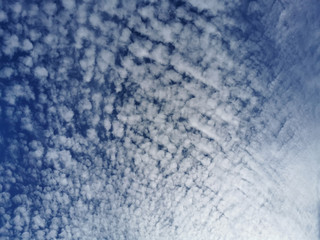 White Cirrus clouds in a blue sky