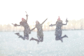 blurred background silhouettes of people fun winter nature