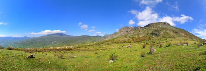 Mountain landscape and small village in distance