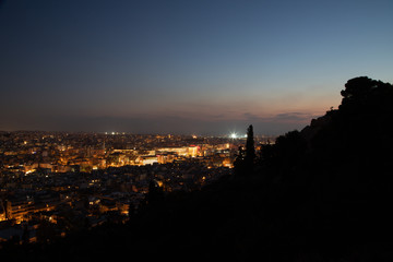 Fototapeta na wymiar Night view of the city from Filopappos Hill in the evening, Athens, Greece