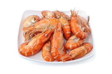 Close up of fresh boiled shrimp in white plate isolated on white background with clipping path