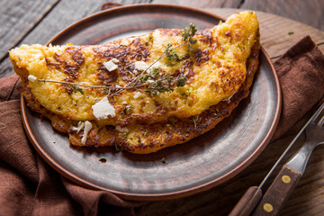 Irish Potato pancakes, latkes or boxty and sauces on wooden background