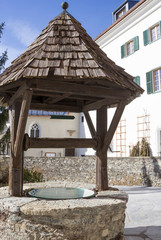 View of old well on sunny day