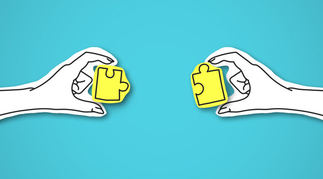 Two hands with shining puzzles over blue background