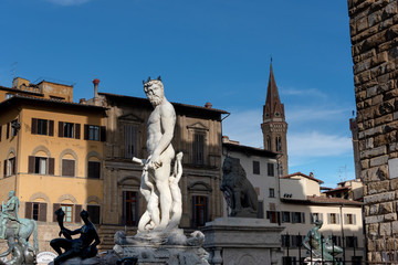 Fototapeta na wymiar statues in front of the old building facade in Florence Tuscany