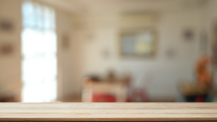 Montage wooden table in living room background with empty wood desk for present product.