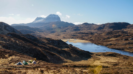 Hiking to Suilven Mountain Peak in the Scottish Highlands, United Kingdom.