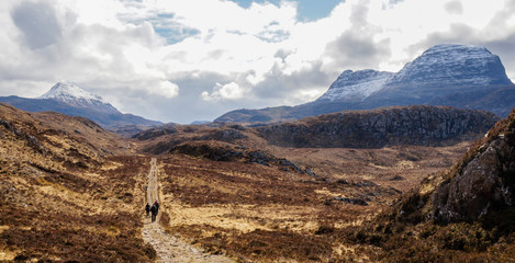 Hiking to Suilven Mountain Peak in the Scottish Highlands, United Kingdom.