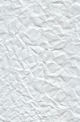 Very wrinkled paper. Seamless pattern with a white crumpled paper texture and stretched again.