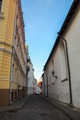 Fototapeta na wymiar Cobbled street in the Old Town in Tallinn, Estonia
