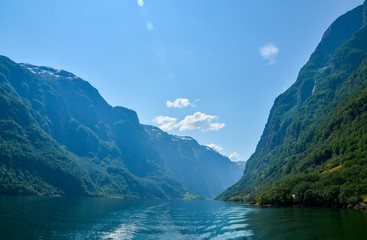 Fototapeta premium Beautiful view from the water on the Sognefjord near Gudvangen in the western part of Norway