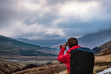 Fototapeta na wymiar Lone traveler - West Highlands Way, Scotland
