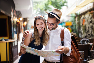 Happy tourist couple in love having fun, travel, smiling on vacation