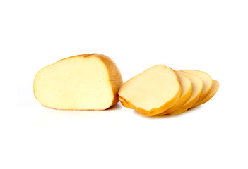 Cheese on a white background. Smoked cheese close-up on a white background.