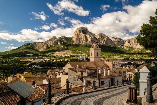 Aerial shot of Barony of Polop in Spain under the beautiful cloudy sky