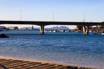 Bouzas bridge and marina with Cies island on background in Vigo