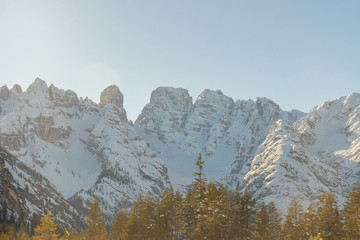 Fototapeta na wymiar Scenic view on the Dolomites mountains on a calm sunny winter day in Trentino, Italy, Europe