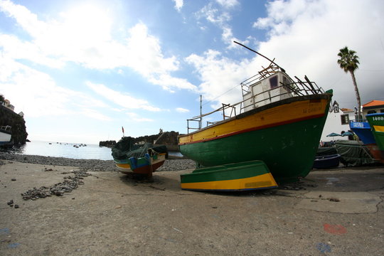 Fishing Boat In The Harbor In Camera De Lobos At Madeira Island