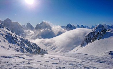 Breathtaking view of the snowy Canadian Rocky Mountains and valley on sunny day © helivideo