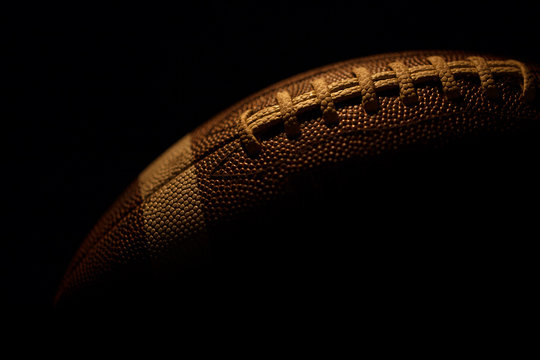 a football with dark background