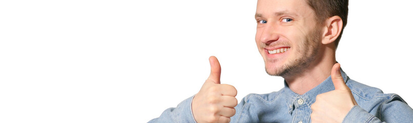 Fototapeta premium Young handsome man over isolated background happy with big smile doing ok sign, thumb up with fingers, like