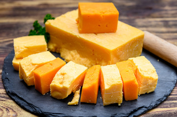 British hard cheeses made from cow milk matured cheddar from Somerset and red leicester