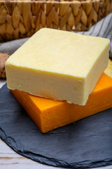 Leicestershire cheese or red leicester and mature cheddar, British hard cheeses made from cow milk