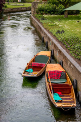 Wooden boats in the middle of a canal