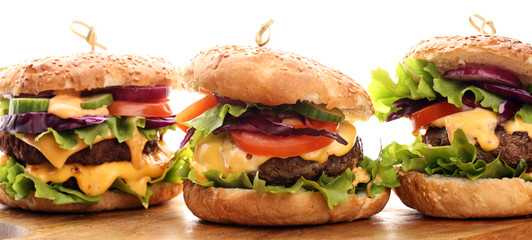 Tasty fresh meat burgers with salad and cheese. Homemade angus burger.