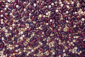 A mix of red beans, lentils and Turkish chickpeas. View from above, background.