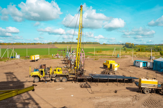 Special equipment for drilling an oil well in an oil field. Workover rig working on a previously drilled well trying to restore production through repair.