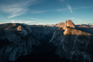 Last light of the day in the Yosemite Valley. Beautiful sunset over the Half Dome in one of the most gorgeous national parks of USA in California