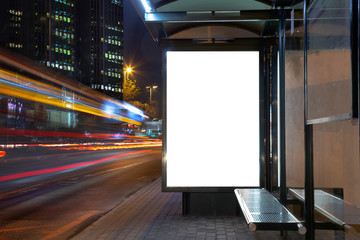 Blank billboard in night traffic - obrazy, fototapety, plakaty