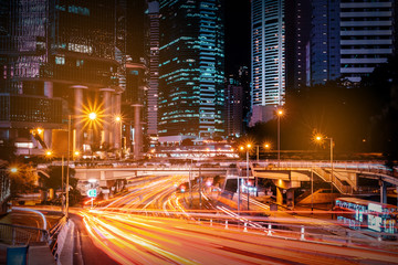 Fototapeta na wymiar city road traffic at night, light trails of cars on street 