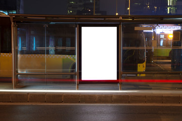 Blank billboard in night traffic