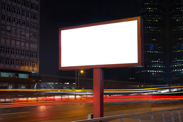Blank billboard in night traffic