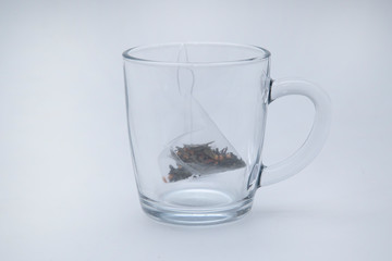 Tea bag. Tea in pyramid bags. Tea for quick use.