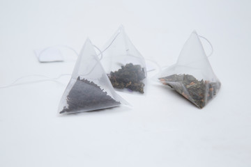 Tea bag. Tea in pyramid bags. Tea for quick use.