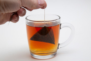 Tea bag. Tea in pyramid bags. Tea for quick use.