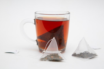 Tea bag. Tea in pyramid bags. Tea for quick use.