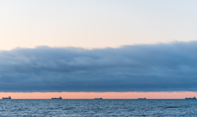 five tanker ocean vessels so far off the horizon