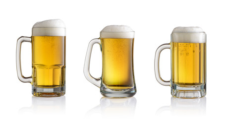 beer glasses with foam isolated on a white background